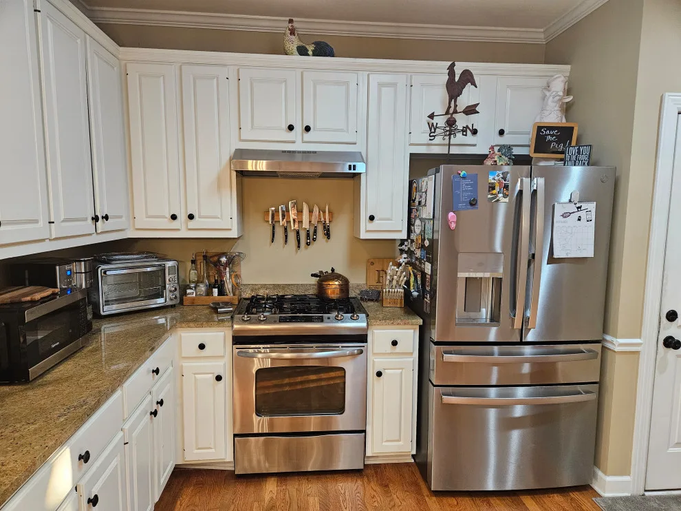 Modern Kitchen Renovation Featuring New Two-Tone Cabinets by Kitchen Solvers Of Spring Hill - Photo 2
