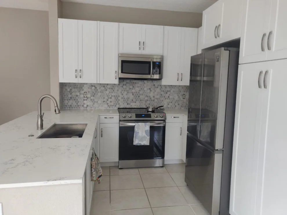 Modern Kitchen Renovation Featuring Wall Removal by Kitchen Solvers Of Fort Lauderdale - Photo 16