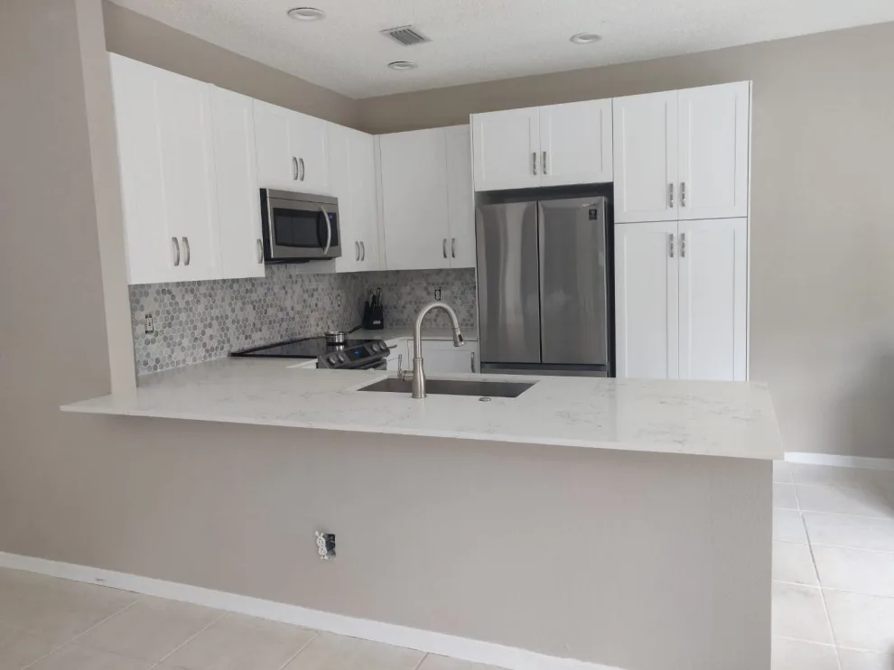Modern Kitchen Renovation Featuring Wall Removal by Kitchen Solvers Of Fort Lauderdale - Photo 14