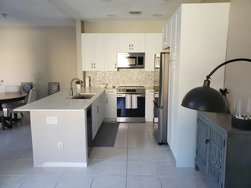 Modern Kitchen Renovation Featuring Wall Removal by Kitchen Solvers Of Fort Lauderdale - Photo 13