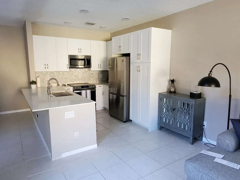 Modern Kitchen Renovation Featuring Wall Removal by Kitchen Solvers Of Fort Lauderdale - Photo 11