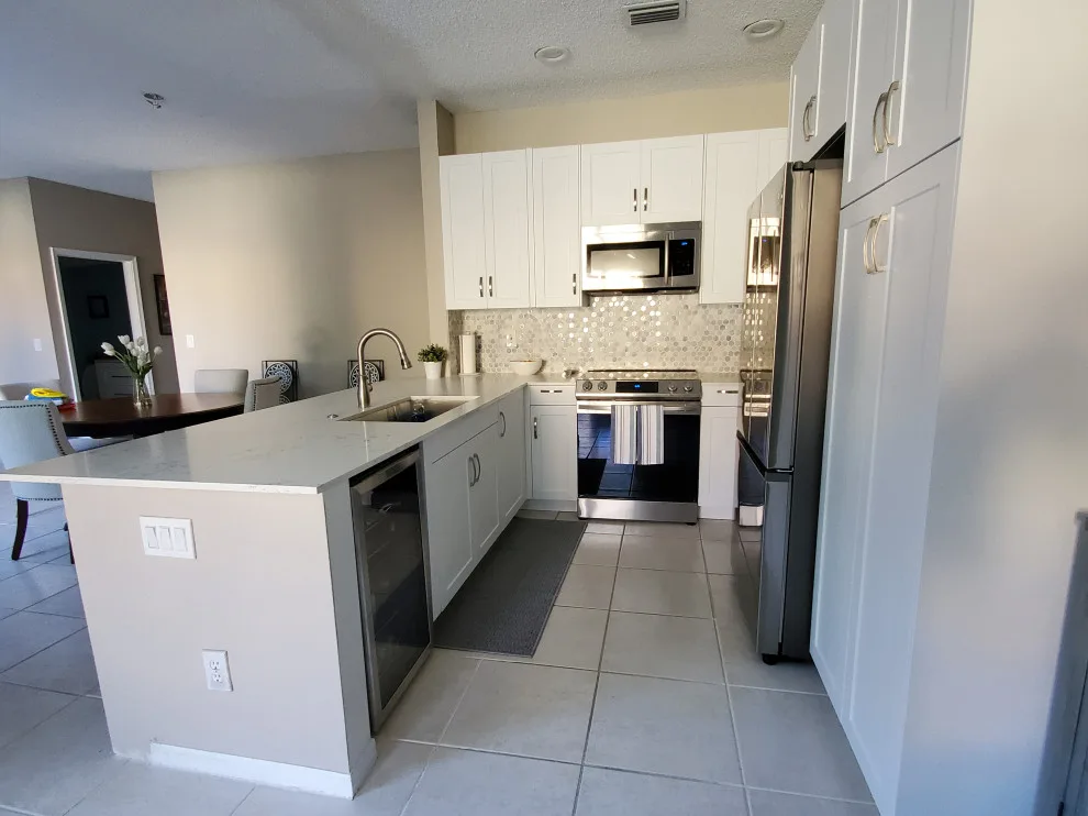 Modern Kitchen Renovation Featuring Wall Removal by Kitchen Solvers Of Fort Lauderdale - Photo 2