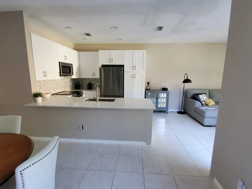 Modern Kitchen Renovation Featuring Wall Removal by Kitchen Solvers Of Fort Lauderdale - Photo 9