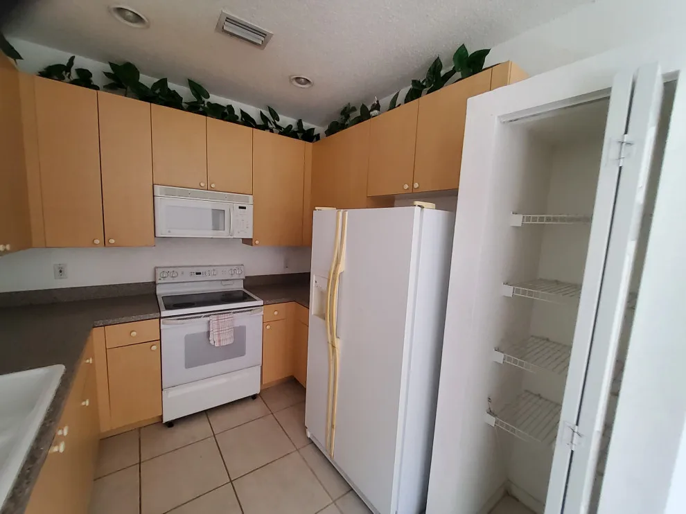 Modern Kitchen Renovation Featuring Wall Removal by Kitchen Solvers Of Fort Lauderdale - Photo 10