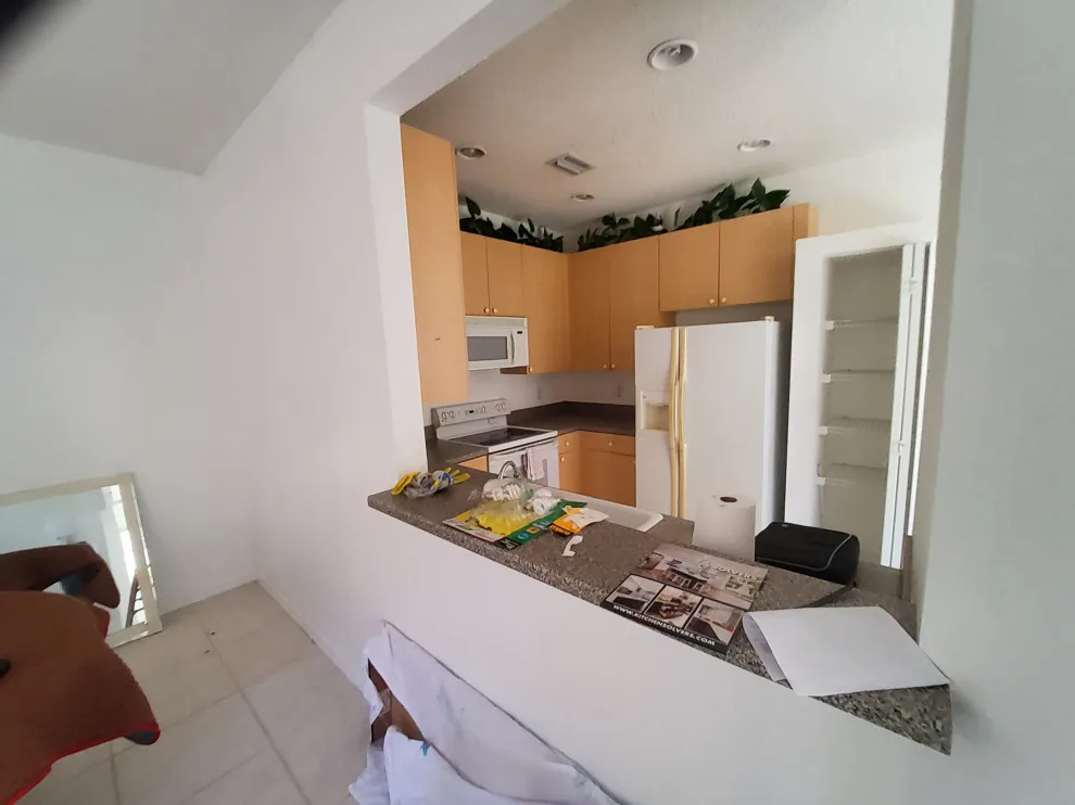 Modern Kitchen Renovation Featuring Wall Removal by Kitchen Solvers Of Fort Lauderdale - Photo 4