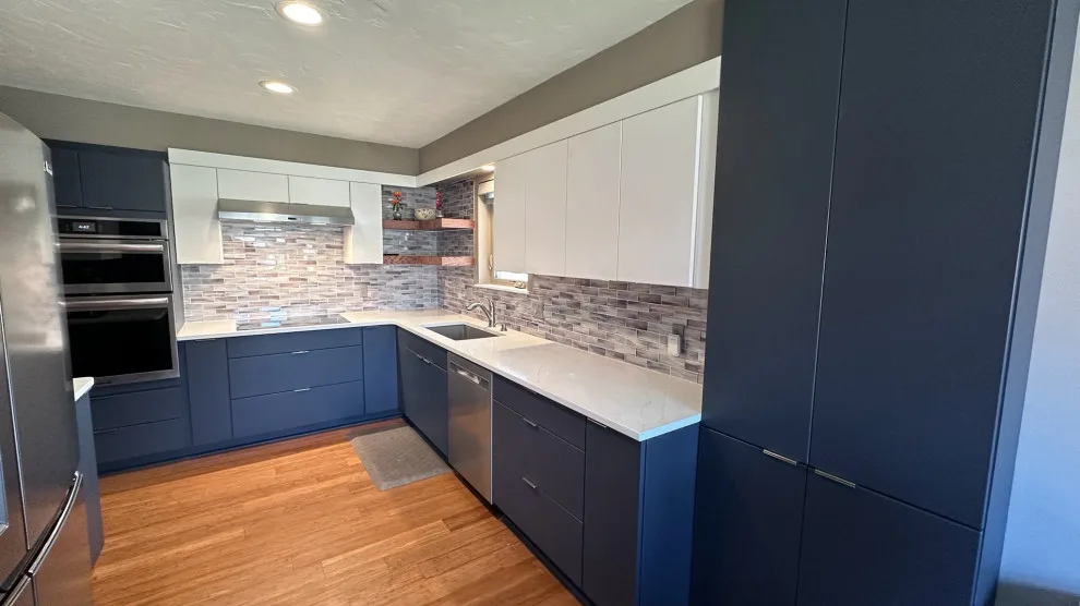 Modern Kitchen Renovation with Dual-Tone Cabinets by Kitchen Solvers Of Oklahoma City - Photo 4