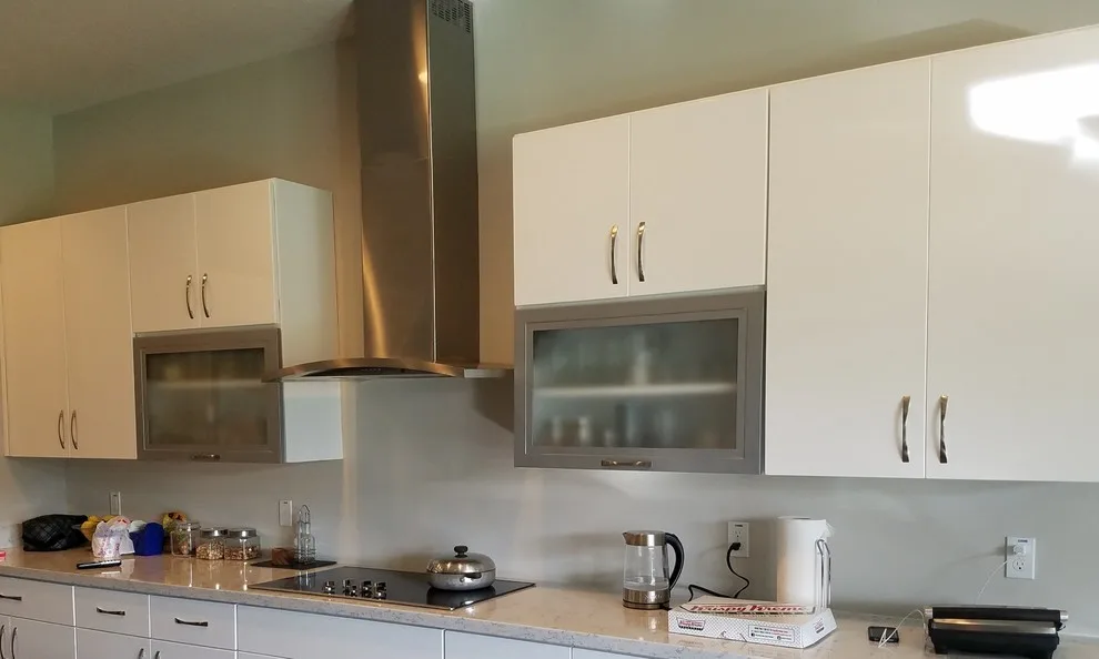 Modern Kitchen Renovation in Reflective White Finish by Kitchen Solvers Of Orlando - Photo 4