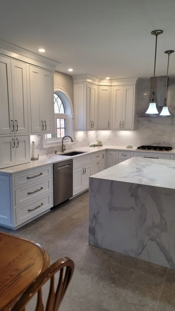 Modern White Kitchen with Waterfall Island by Taylor And Stevens Cabinetry - Photo 2