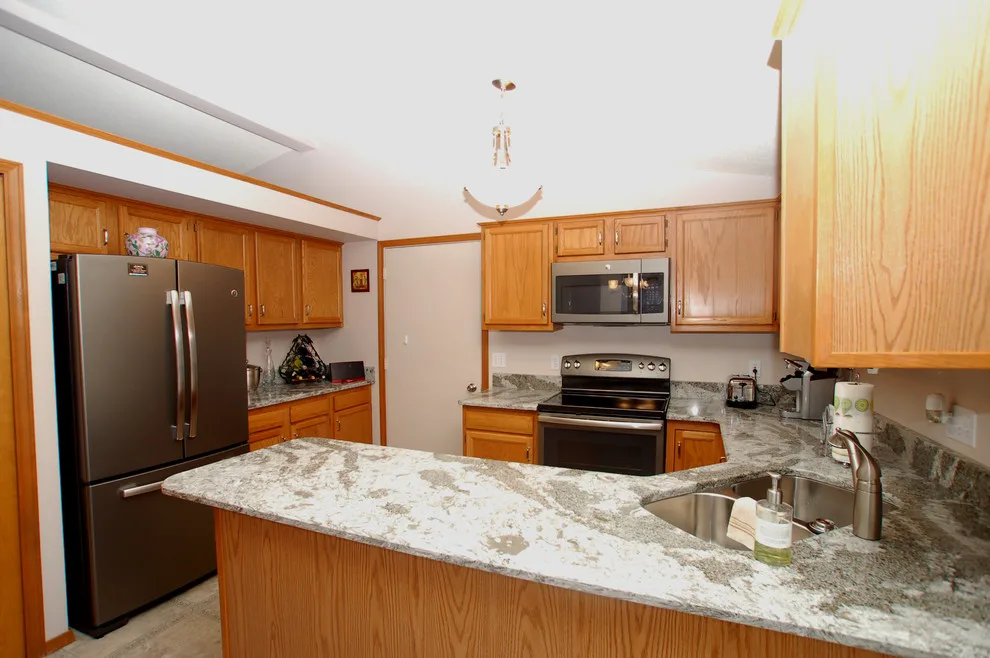 Midland, MI Countertop Replacement Services by Tri-City Remodeling & Nowak Cabinets - Photo 18