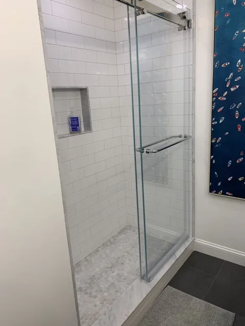 Sleek and Fresh Bathroom Renovation by K & M Flooring-Renovations Inc. - Photo 2