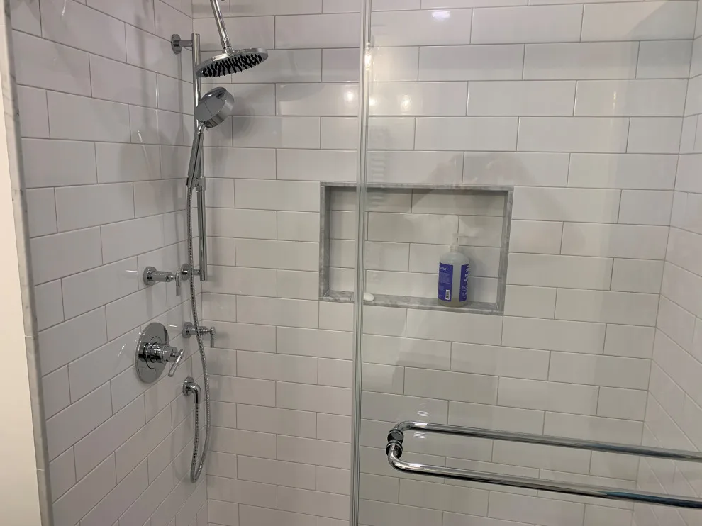 Sleek and Fresh Bathroom Renovation by K & M Flooring-Renovations Inc. - Photo 4