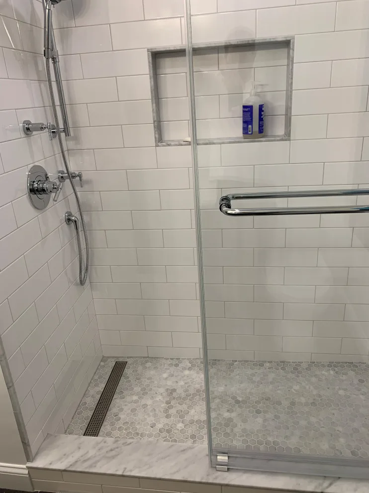 Sleek and Fresh Bathroom Renovation by K & M Flooring-Renovations Inc. - Photo 5