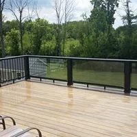Tailored Deck Featuring Spiral Stairs by Hallowed Ground Home Improvement LLC - Photo 7