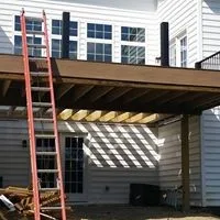 Tailored Deck Featuring Spiral Stairs by Hallowed Ground Home Improvement LLC - Photo 2