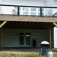 Tailored Deck Featuring Spiral Stairs by Hallowed Ground Home Improvement LLC - Photo 6