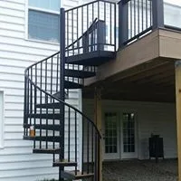 Tailored Deck Featuring Spiral Stairs by Hallowed Ground Home Improvement LLC - Photo 9