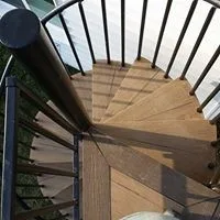 Tailored Deck Featuring Spiral Stairs by Hallowed Ground Home Improvement LLC - Photo 8
