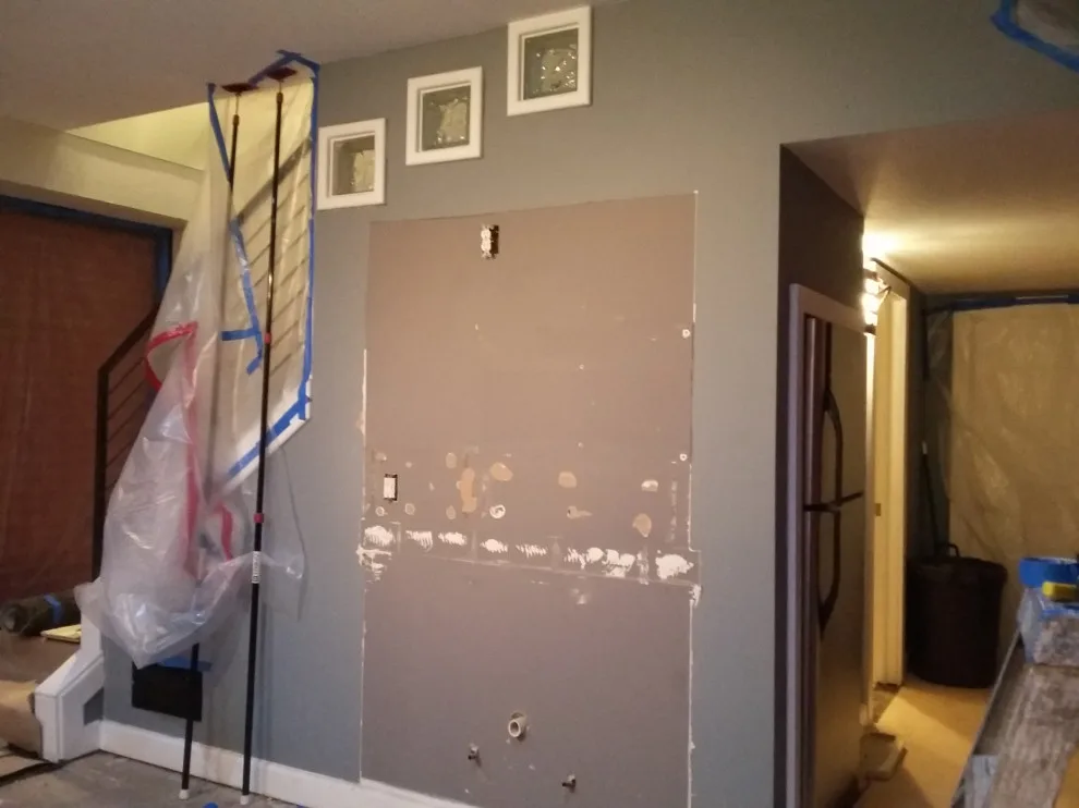 Basement Renovation Featuring Bar Space and Steam Shower by EWC Home Services & Design - Photo 5