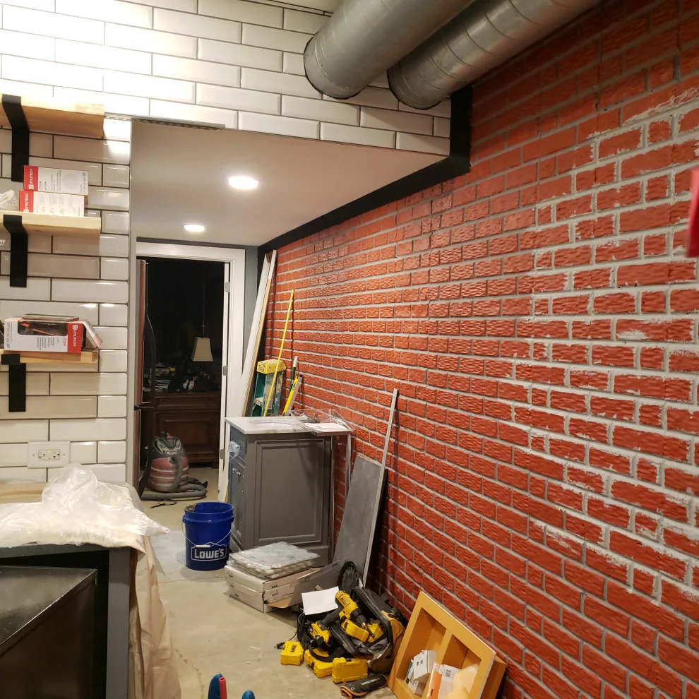 Basement Renovation Featuring Bar Space and Steam Shower by EWC Home Services & Design - Photo 11
