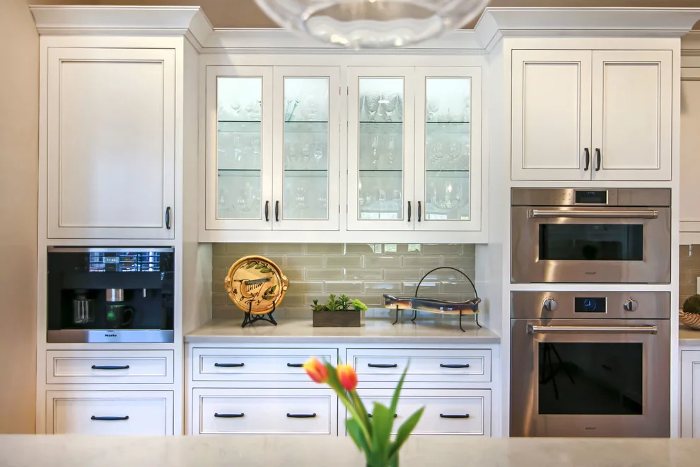 Walnut Island in a White Designer Kitchen by Greenbrook Design Center - Photo 13