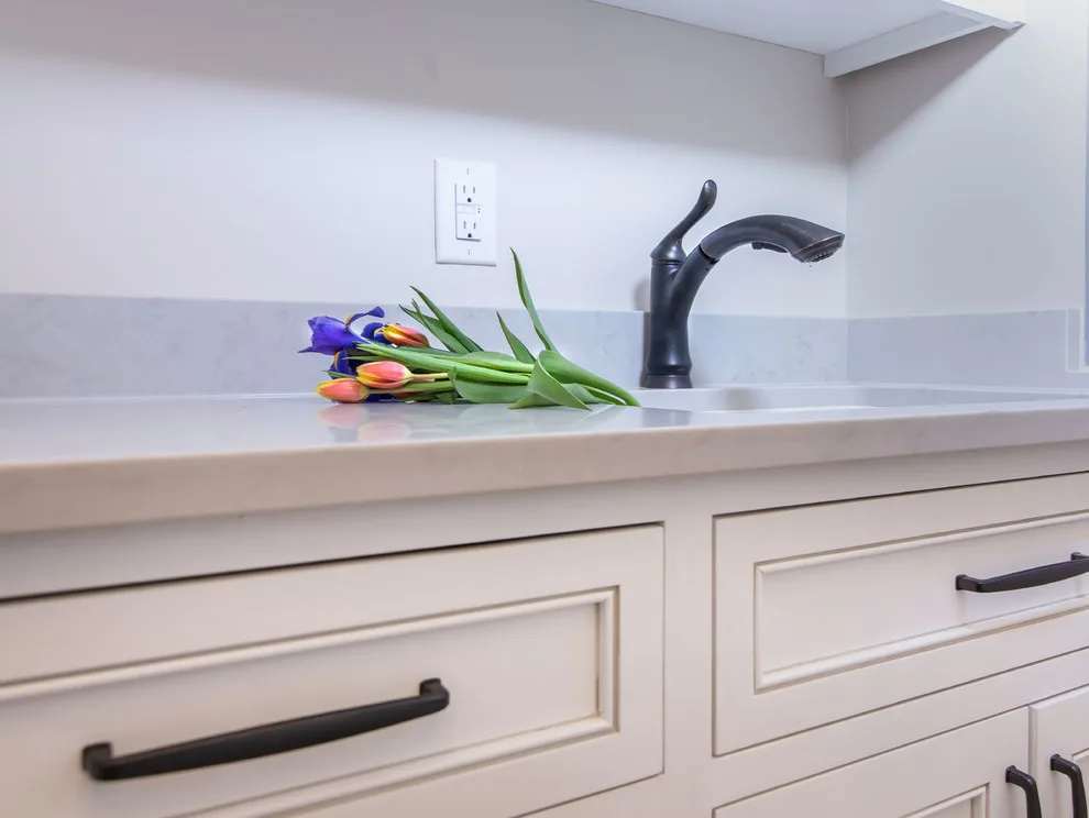 Walnut Island in a White Designer Kitchen by Greenbrook Design Center - Photo 2