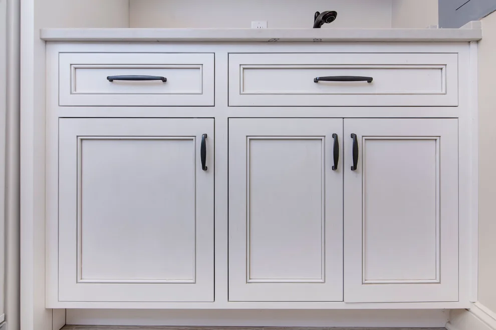 Walnut Island in a White Designer Kitchen by Greenbrook Design Center - Photo 16