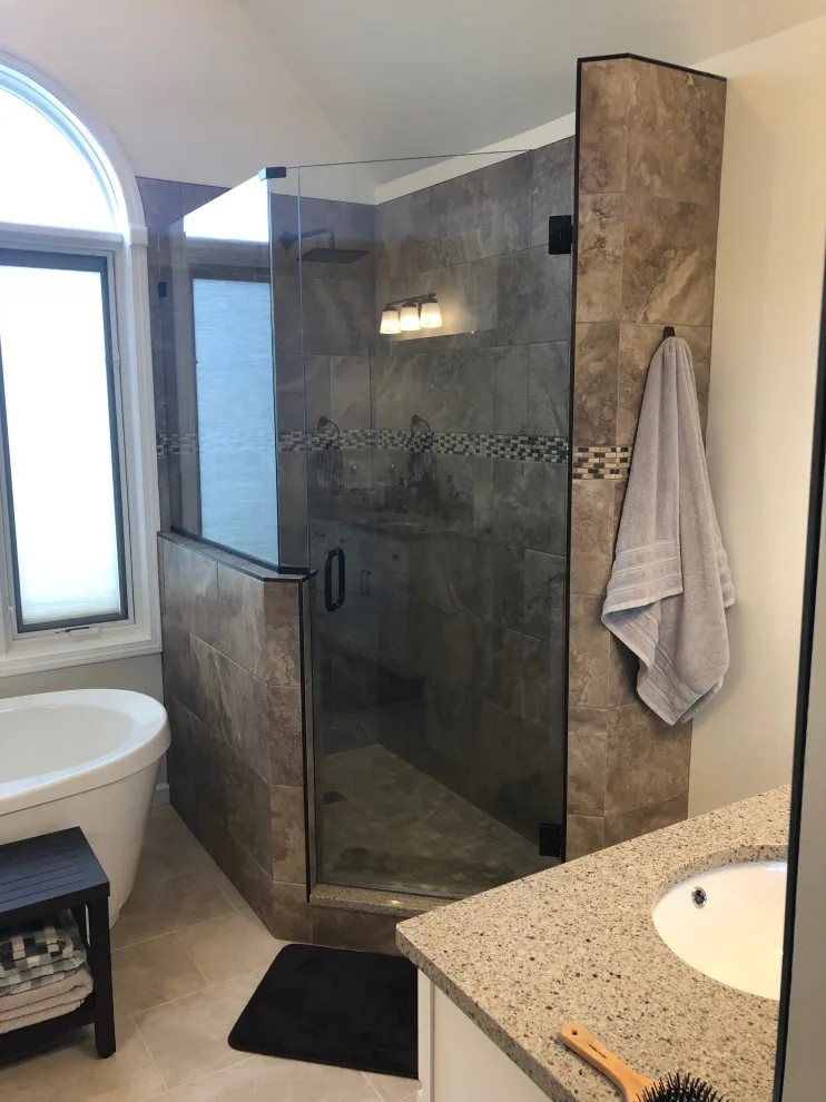 Personalized tiled shower by HM Remodeling - Photo 6