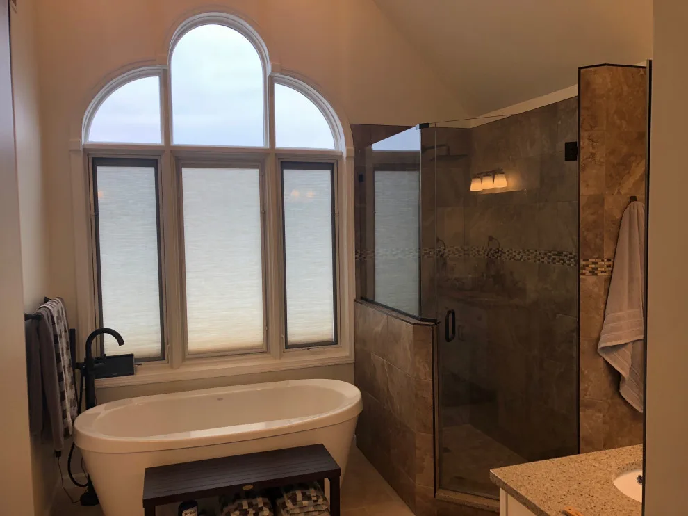 Personalized tiled shower by HM Remodeling - Photo 7