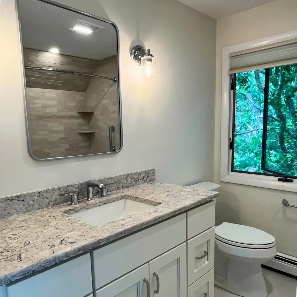 Double Bathroom Renovation by IKitchens Etc, LLC - Photo 3