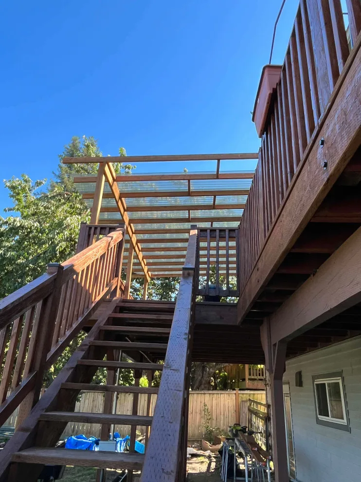 Deck Renovation, Staining & Roof Construction by Handyman Rescue Team - Photo 13