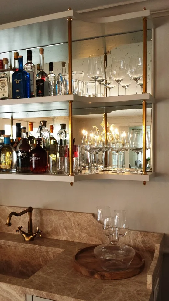 Bar area in the dining room by Belle Ville Design Build - Photo 4