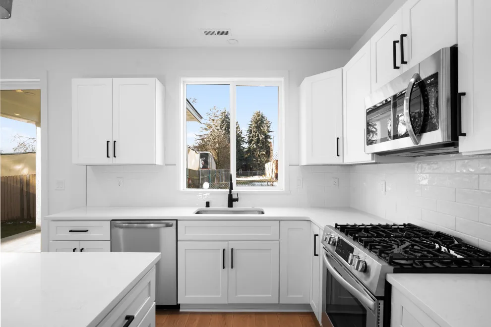 Shiva Lane - Light-Colored Kitchen by Cabinets Plus, LLC - Photo 5