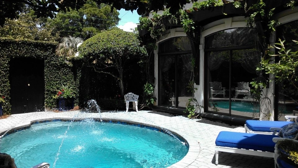 Hand Carved Arbor by KAPPLE Landscape Design - Photo 4