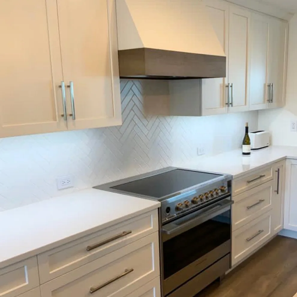 Sophisticated White Kitchen Renovation in Naples by Italian PNR Group - Photo 3
