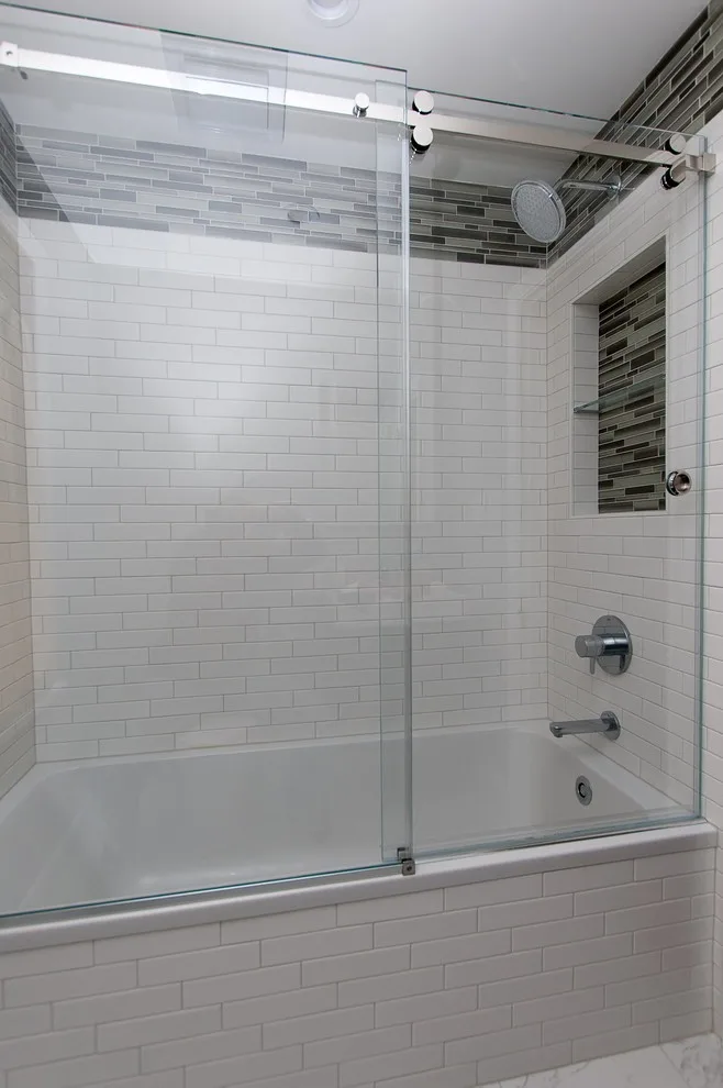 Expanded tub in white bathroom by Ray Tile & Bath - Photo 4
