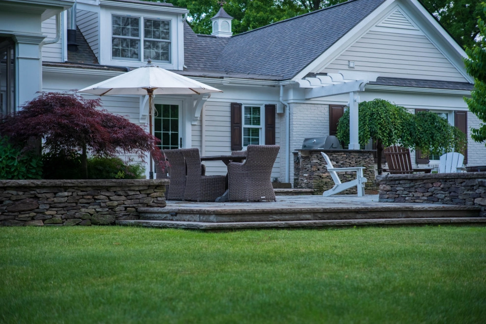 E. Streetsboro St. by KGK Gardening & Design Corp - Photo 27