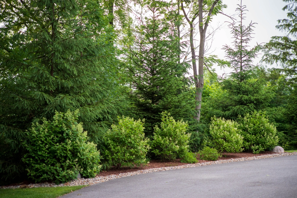 E. Streetsboro St. by KGK Gardening & Design Corp - Photo 7