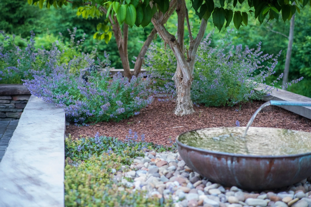 E. Streetsboro St. by KGK Gardening & Design Corp - Photo 9