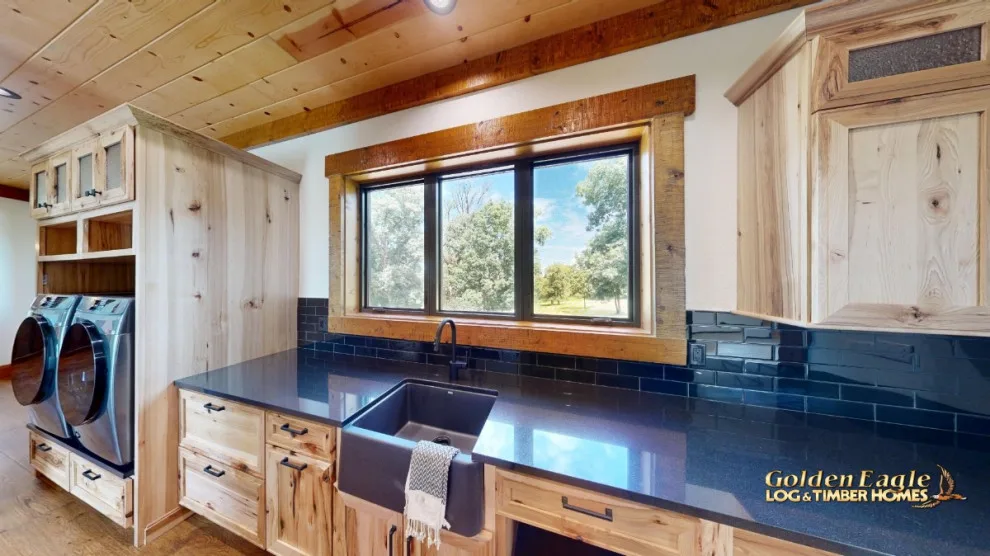 Stylish Laundry by Golden Eagle Log & Timber Homes - Photo 6