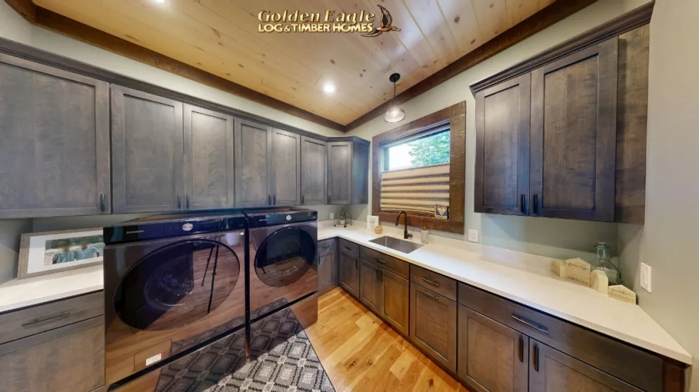 Stylish Laundry by Golden Eagle Log & Timber Homes - Photo 5