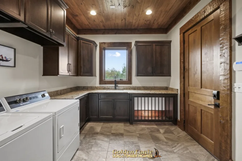 Stylish Laundry by Golden Eagle Log & Timber Homes - Photo 11