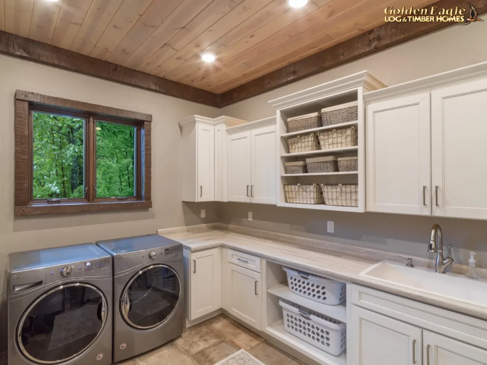Stylish Laundry by Golden Eagle Log & Timber Homes - Photo 16