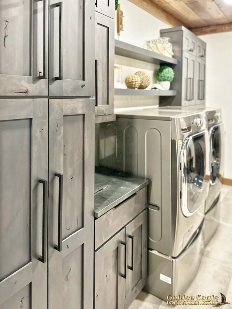 Stylish Laundry by Golden Eagle Log & Timber Homes - Photo 9