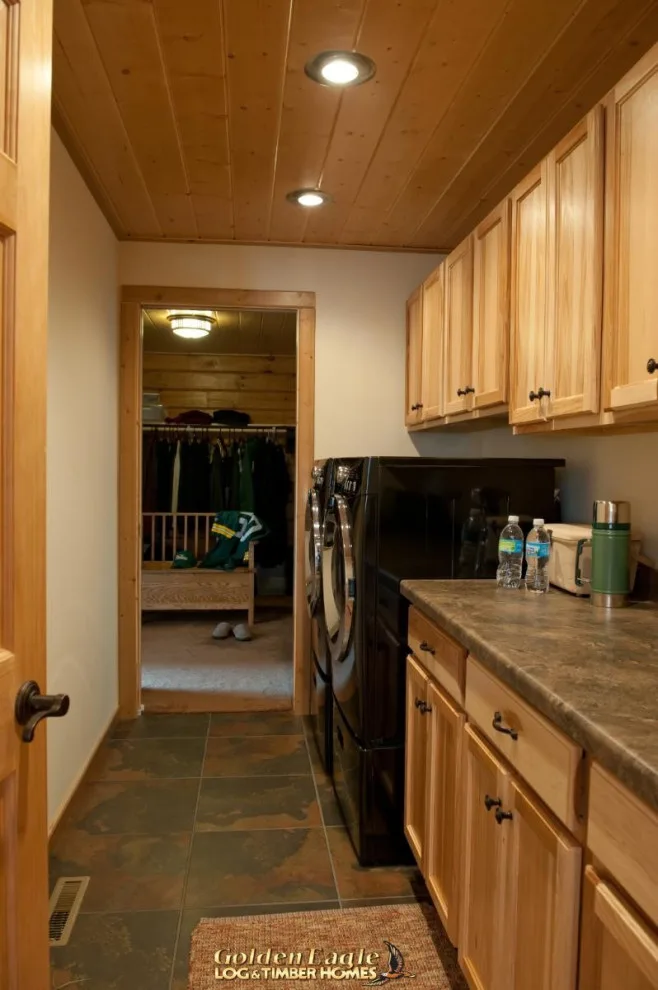 Stylish Laundry by Golden Eagle Log & Timber Homes - Photo 14