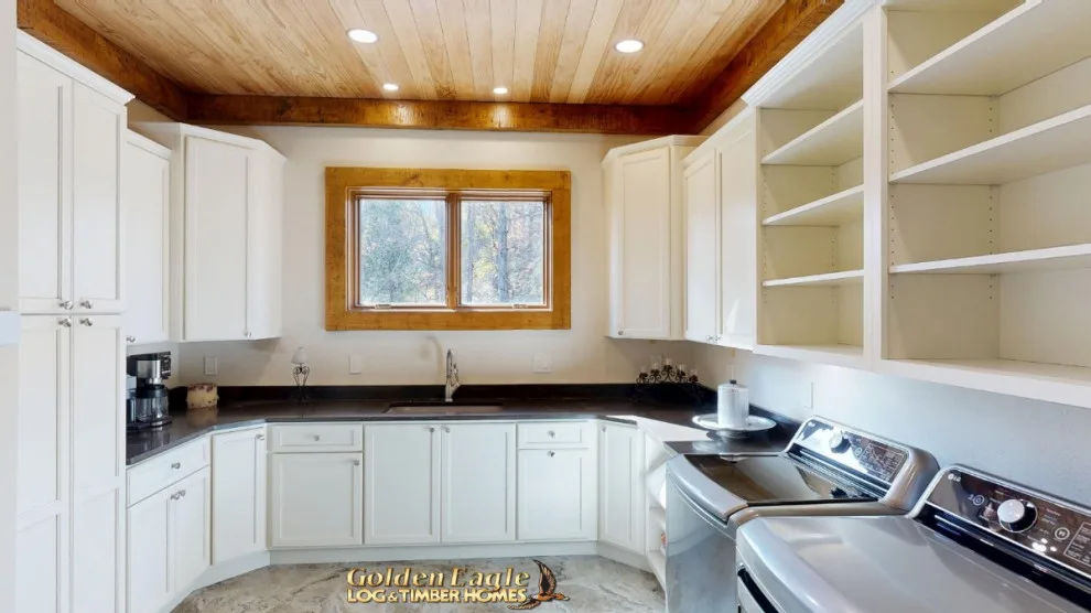 Stylish Laundry by Golden Eagle Log & Timber Homes - Photo 7