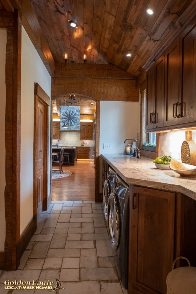 Stylish Laundry by Golden Eagle Log & Timber Homes - Photo 17