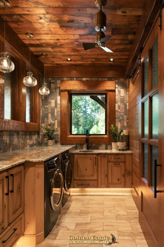 Stylish Laundry by Golden Eagle Log & Timber Homes - Photo 10