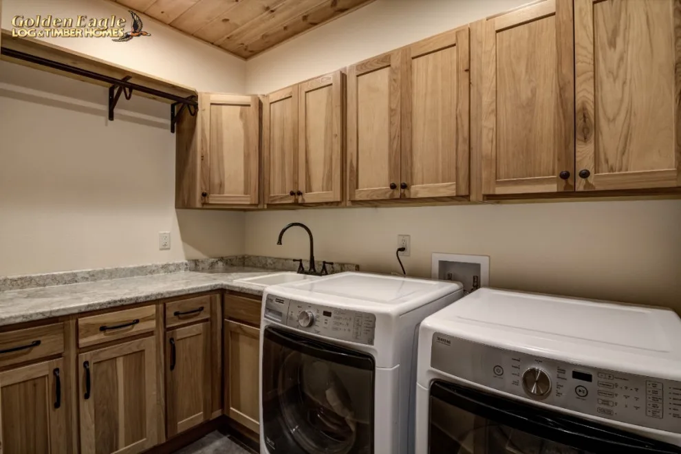 Stylish Laundry by Golden Eagle Log & Timber Homes - Photo 12