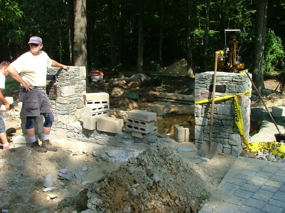Main driveway with koi ponds on both sides . by Koi Villa Water Garden Center - Photo 26