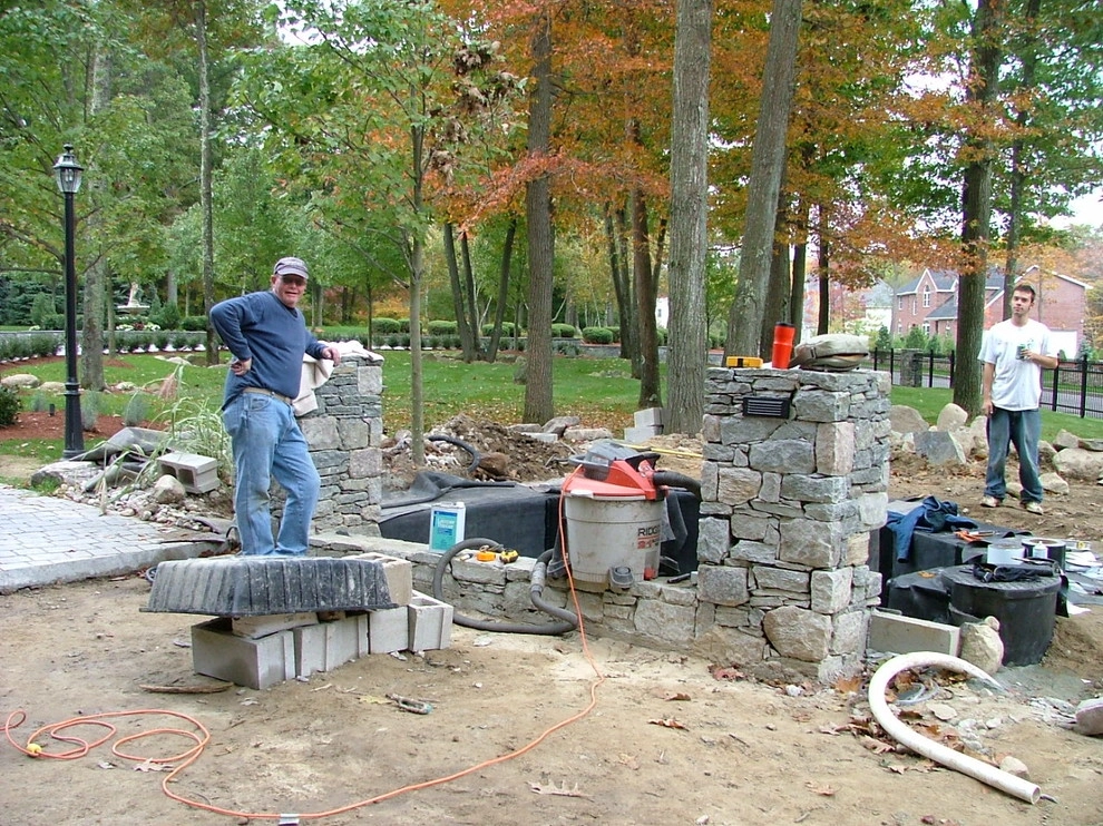 Main driveway with koi ponds on both sides . by Koi Villa Water Garden Center - Photo 23